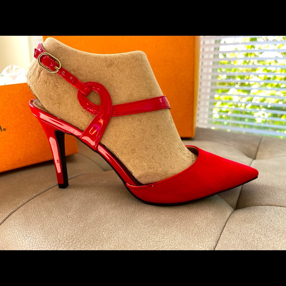 UNISA Vibrant red pumps. Purchased online but fits a little tight on me.